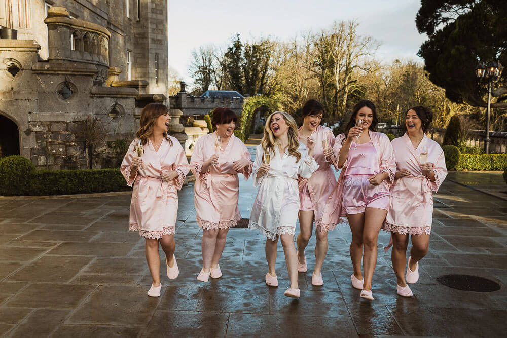 Bride laughing with bridesmaids at Markree Castle Sligo